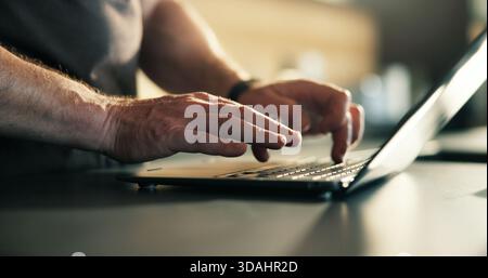 Hands, man and typing on tablet at house for research, proofreading and article submission. Male person, freelancer or digital for editor feedback Stock Photo
