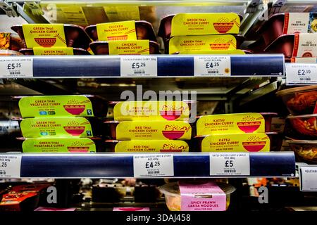 Loondon UK, December 10 2025, Selection Of Supermarket Asian Style Spicy Ready Meals Stock Photo