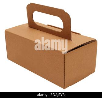 Cardboard box features a handle for easy transport and storage. It is cut out from a white background, suitable for various uses like packing or organ Stock Photo