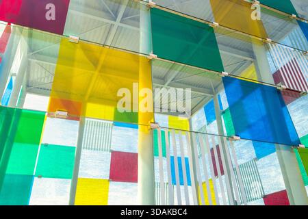 Malaga, Spain - September 12, 2024: The Pompidou Centre complex building. Colorful glass panels create a vibrant architectural design. Stock Photo