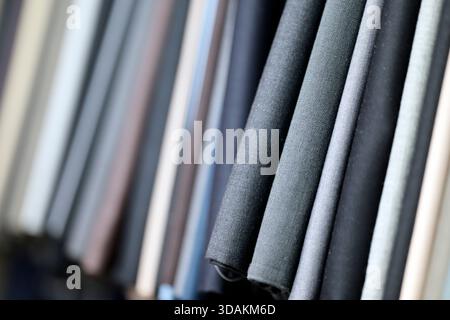 Fabric selection at a tailor's. Made-to-measure suit. Ho Chi Minh city. Vietnam. Stock Photo