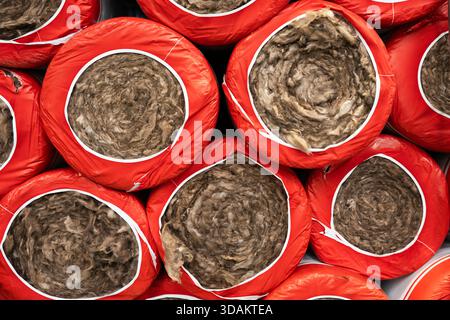 Rolls of thermal insulation material . Mineral wool  for roofing insulation . Texture background Stock Photo