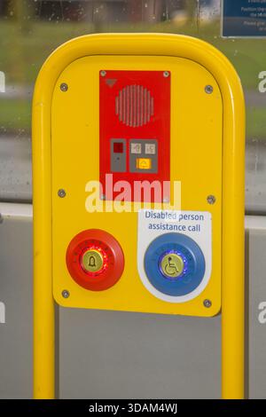 4 December 2025 A Disabled; Emergency alarm located in a carriage on a Metrolink Bee Network tram in Manchester England Stock Photo