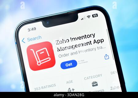 New Delhi, India 11 jaunary 2026:- Closeup of zoho inventory management app on smartphone screen against blurred blue sky background Stock Photo