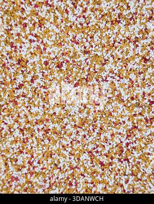 decorative multicolored mosaic granulated wall plaster texture Stock Photo