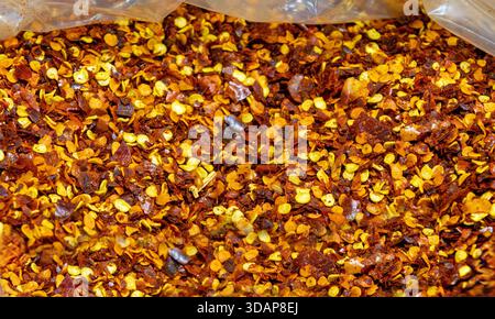 Ground dry paprika spice pattern background made from dried and ground red peppers Stock Photo