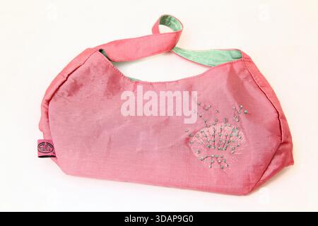Small pink Body Shop handbag  with Diamanté Motif Stock Photo