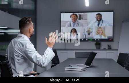 Medical Team Meeting Online With Doctors and Patients in a Virtual Conference Setting Stock Photo