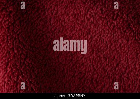 Deep red faux fur texture background Stock Photo