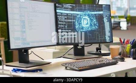 Advanced AI algorithms running on computer monitors in empty startup workspace deploying machine learning models. Artificial intelligence coding platform on PC screens in modern office Stock Photo