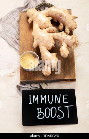 Fresh ginger on a light background. Dry ginger. Sliced ​​ginger, ginger root. Top view. Traditional alternative medicine for immunity. Stock Photo