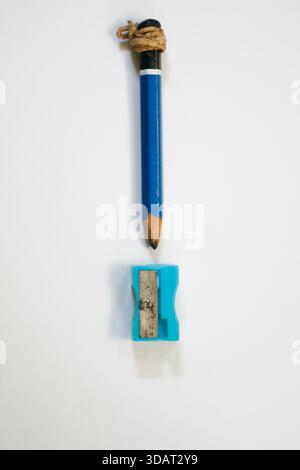 close up of pencil and sharpener isolated on white background Stock Photo