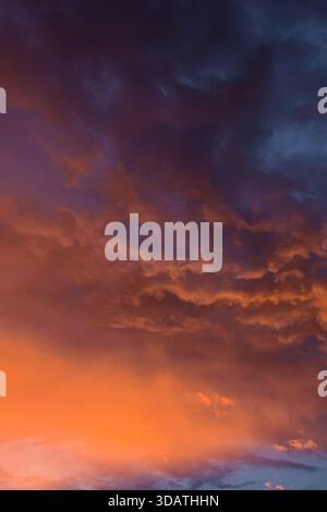 Heavenly view of the colorful sunset. The soft glow creates a beautiful, mesmerizing spectacle, perfect for conveying peace and tranquility. Stock Photo