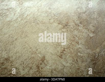 Pale brown marble, flat polished natural stone surface close-up. Background, texture, seamless. Stock Photo