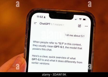 Person's hand holding an iPhone using the OpenAI GPT-5.1 model within the ChatGPT app, Lafayette, California, November 13, 2025. (Photo by Smith Collection/Gado/Sipa USA) Stock Photo