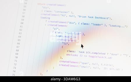 Real-time generated written computer source code in closeup shot on monitor - black letters on white background - concept of digitization, science, re Stock Photo