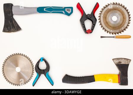 Flat lay of new and used hand tools on white background. Large collection of various tools and bits arranged on white. Stock Photo