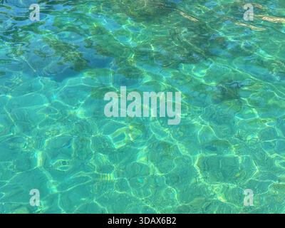 Turquoise transaprent tranquil sea surface Stock Photo