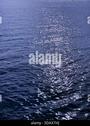 Blue water glittering ripples surface Stock Photo