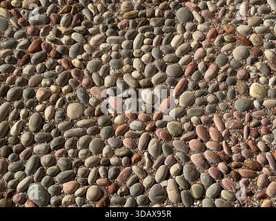 Stones pavement gravel pebbles background Stock Photo