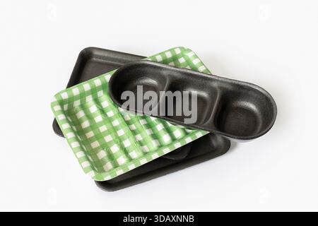Group of Disposable foam trays for food packaging industry isolated on white background Stock Photo