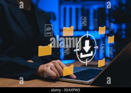 File download and data transfer concept. Using laptop with download and folder icons symbolizing document file downloading, data management, Stock Photo