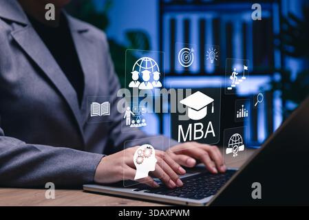 MBA program concept. Master of Business Administration. Businessperson using laptop with icons of business learning, education, leadership, global Stock Photo