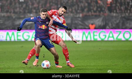 From left: Rani Khedira (Union Berlin), Chrislain Matsima (FC Augsburg ...