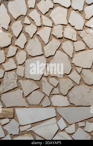 Polished rock stonework wall rustic cladding Stock Photo