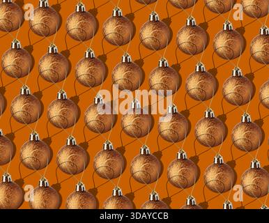 Christmas balls on orange background. Festive pattern design Stock Photo