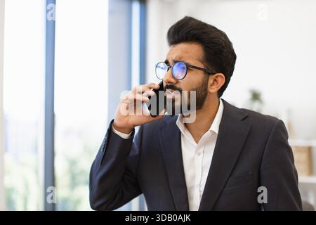 Arab Businessman on Phone Stock Photo