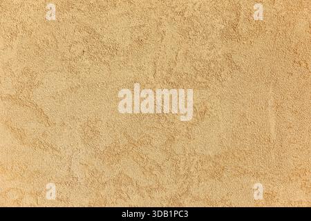Textured beige surface with subtle patterns for background design. Stock Photo
