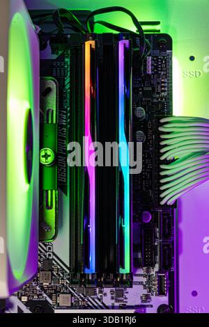 Close-up of RGB DDR5 memory inside a modern PC. Tech concept highlighting rising RAM prices, hardware demand and AI-driven component shortages. Stock Photo