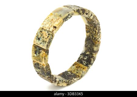 Handcrafted Baltic chalk amber bracelet showing natural stone structure and patterns, studio photography on white background Stock Photo