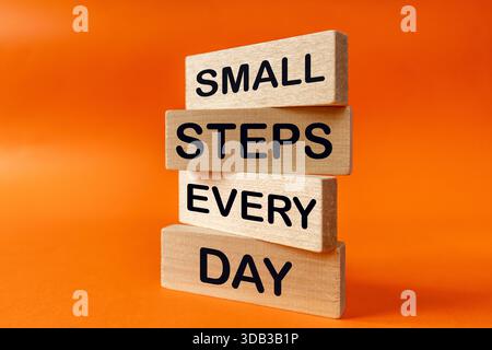 Small steps every day. Motivational slogan. Working on oneself. Conceptual words, Business symbol. Achieving goals. Project for a lifetime Stock Photo