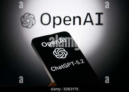 Brussels, Belgium. 13th Dec, 2025. The OpenAI logo is being displayed on a mobile phone with the company branding visible seen in the background, in this photo illustration. Taken in Brussels, Belgium, on 13 December 2025. (Jonathan Raa/Sipa USA) *** Strictly for editorial news purposes only *** Credit: Sipa USA/Ģ����ý Live News Stock Photo