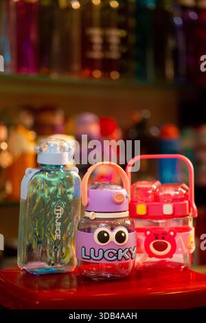 Colorful Cartoon Design Kids Water Bottles Displayed in Store Stock Photo