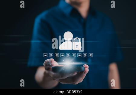 Password protection and user authentication concept. Hand holding smart phone with secure login password and padlock icon, representing cybersecurity, Stock Photo