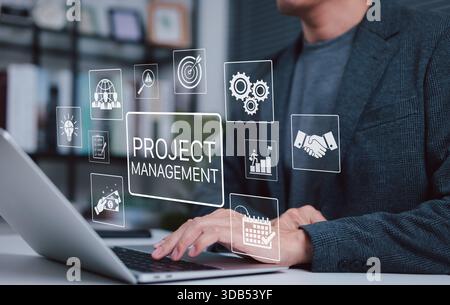 Project management technology concept. Businessman working on laptop with icons representing planning, task tracking, team collaboration, deadline, Stock Photo