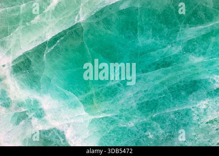Green Fluorite. Gemstone background. Matt natural semi precious mineral pattern. Semiprecious stone texture, ceramic wall, floor digital tiles Stock Photo