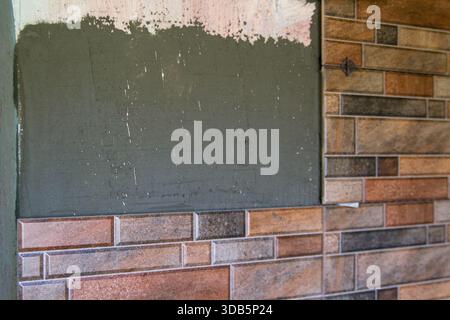 work on laying tile brick squares Stock Photo