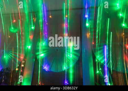 Abstract background where image shows light trails from garlands Stock Photo
