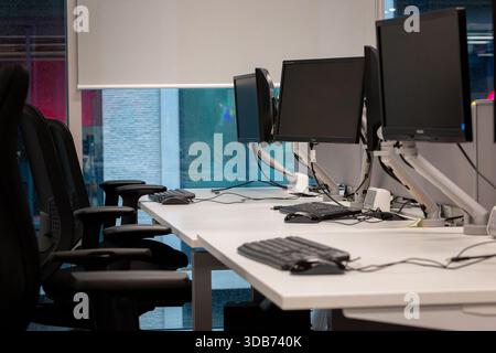 Flexible working practices leading to modern, brand new, empty offices. Stock Photo