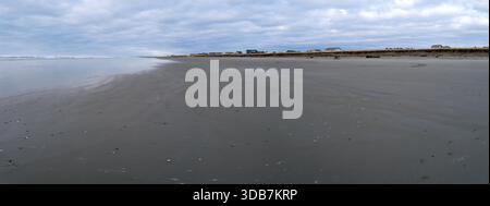 Panorama of the beach on the Pacific coast in late afternoon near Westport in Washington, USA Stock Photo