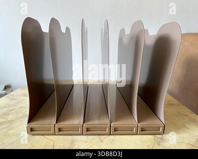 Vintage desktop vertical metal file holder organizer. Stock Photo
