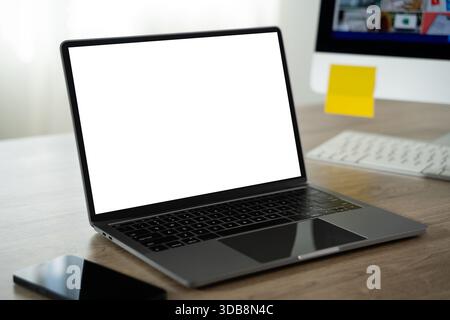 Laptop with blank screen on table. on laptop computer with blank copy space screen for your advertising text message on table Stock Photo