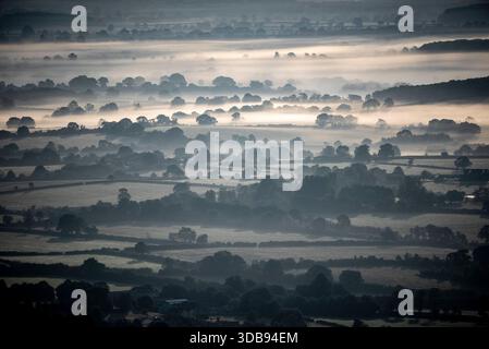 PA REVIEW OF THE YEAR 2025. File photo dated 11/06/25: The sun rises, and the mist begins to clear over the Somerset Levels. Issue date: Monday December 15, 2025. Stock Photo
