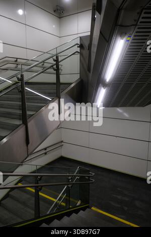 Striking geometric staircase with sleek lines, showcasing minimalist design and urban architecture. Stock Photo