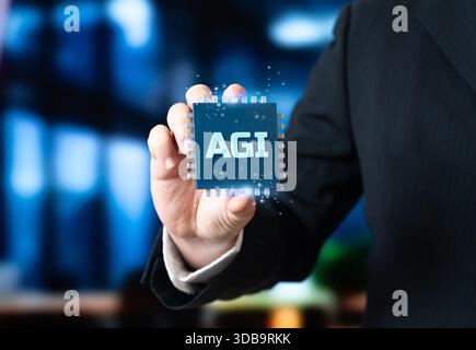 Artificial General Intelligence microchip in the hand of a businessman. A new stage in AI development. Advanced intelligence and transformative econom Stock Photo