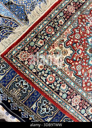 Rich red and blue traditional Persian style carpet pattern Stock Photo